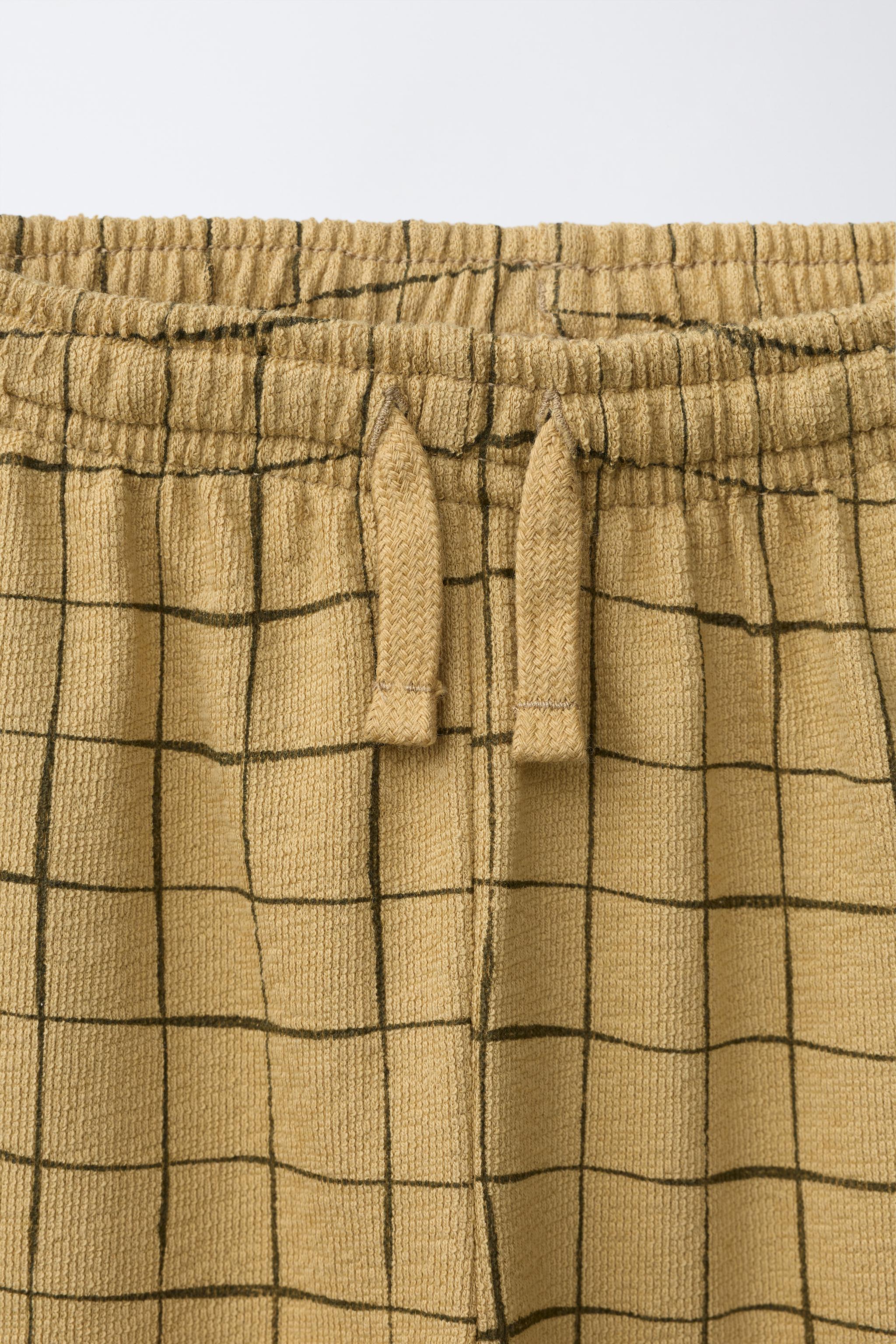 PANTALON IMPRIMÉ À CARREAUX